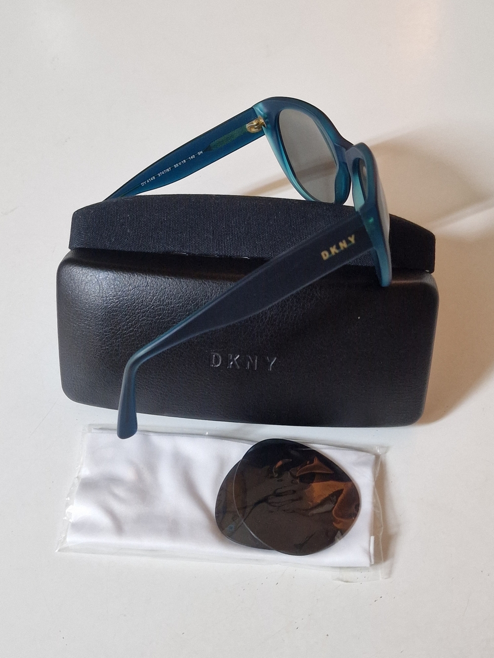 DKNY Teal Sunglasses with Gold Logo Accents